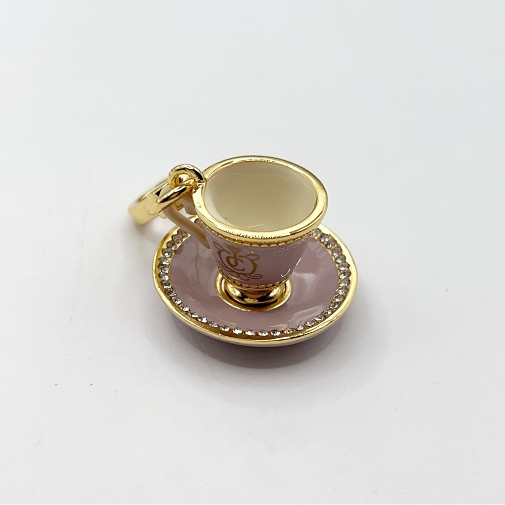 Juicy Couture pink teacup charm